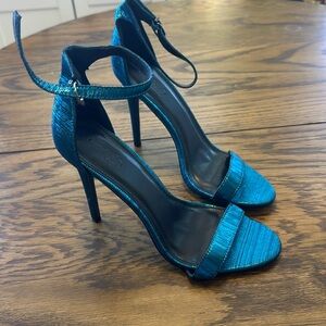Teal stilettos.